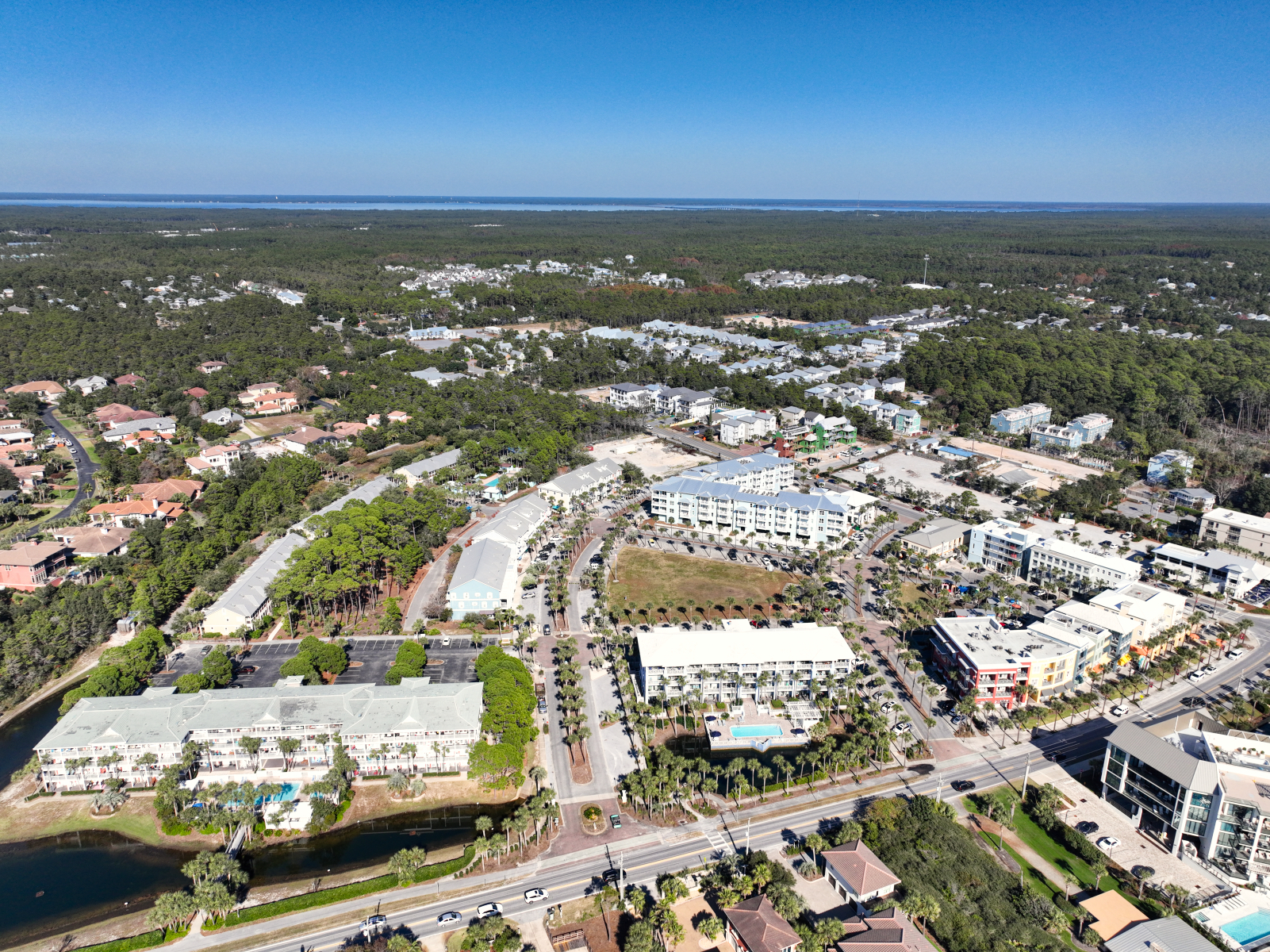 Aerial view of Santa Rosa Beach Florida showing residential neighborhoods and town center near Scenic Highway 30A.